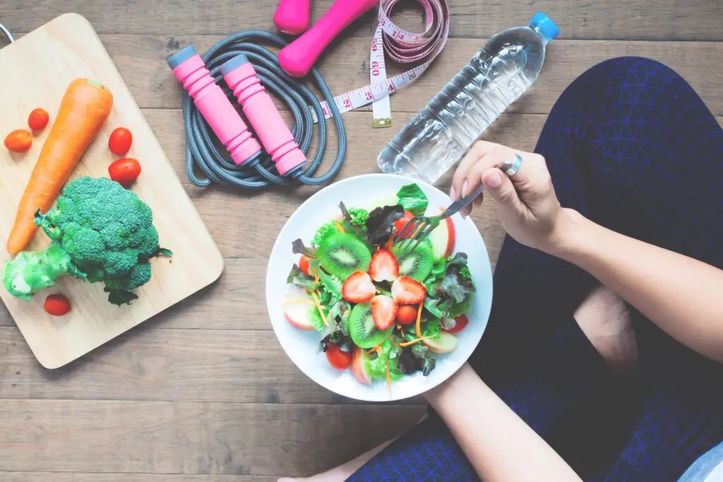 Yoga female cooking homemade salad